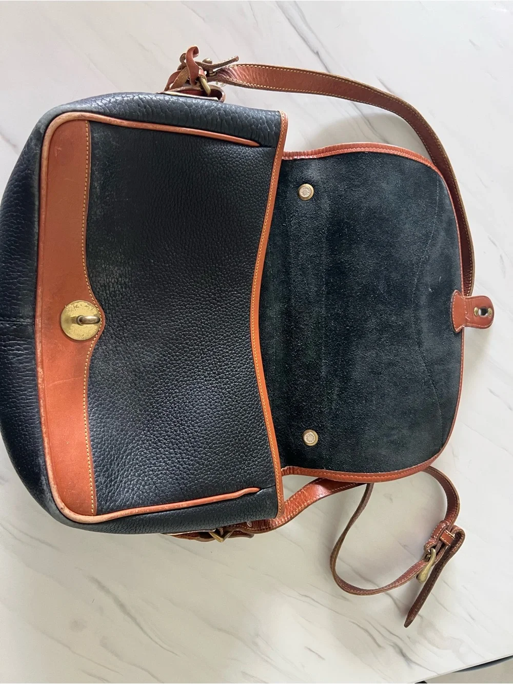 Dooney & Bourke Black and Brown Leather Satchel with Brass Turn Lock